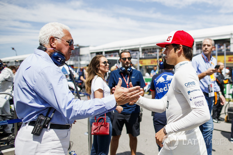 Lawrence Stroll wishes good luck to his son Lance Stroll, Williams Racing, on the grid