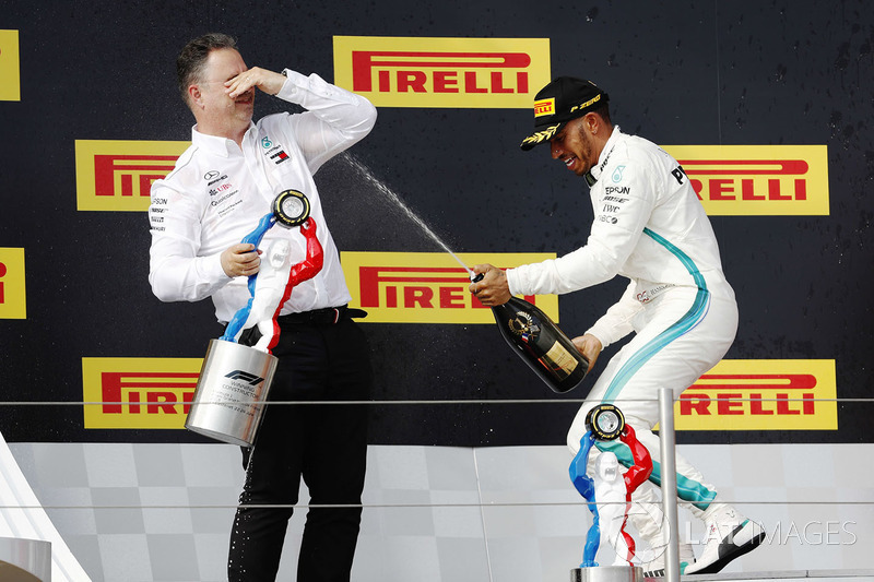 Ron Meadows, Sporting Director, Mercedes AMG, and Lewis Hamilton, Mercedes AMG F1, spray the champagne on the podium