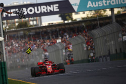 Race winner Sebastian Vettel, Ferrari SF71H crosses the line and takes the chequered flag