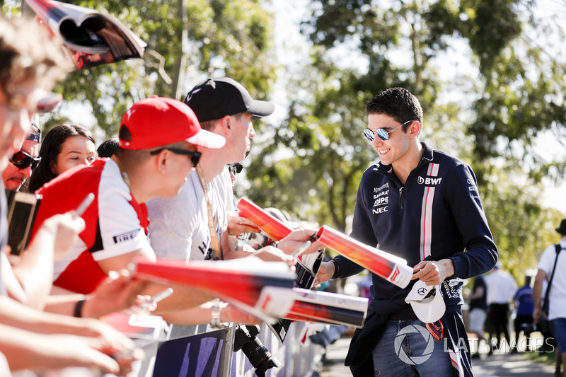 Esteban Ocon, Force India, signs an autograph