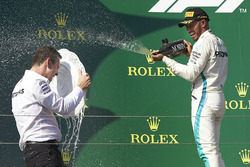 The Mercedes Constructors trophy delegate and race winner Lewis Hamilton, Mercedes AMG F1, on the podium