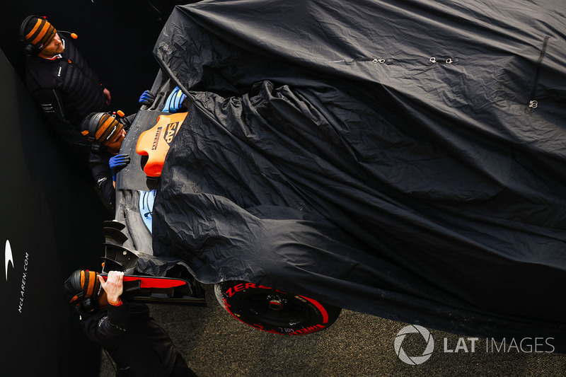 The McLaren MCL33 of Fernando Alonso is returned to the pits
