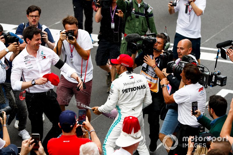 Lewis Hamilton, Mercedes AMG F1, 1st position, sprays Champagne at Toto Wolff, Executive Director (Business), Mercedes AMG