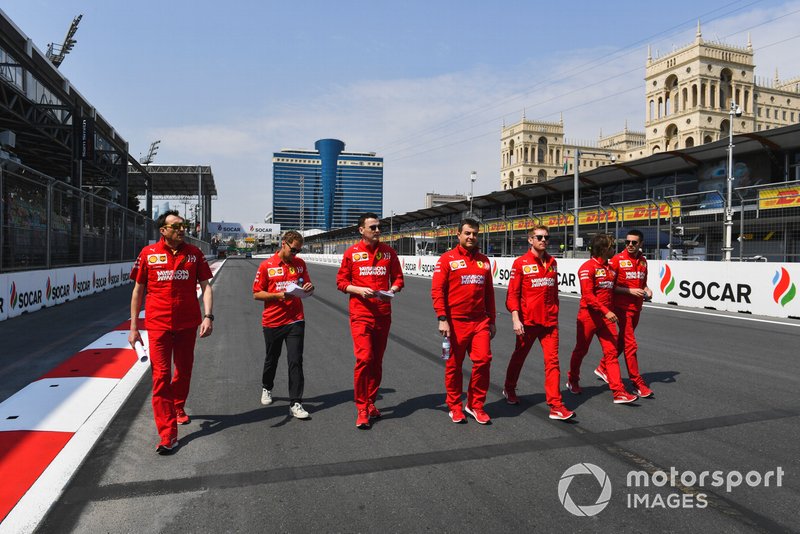 Sebastian Vettel, Ferrari walks the track with his engineers