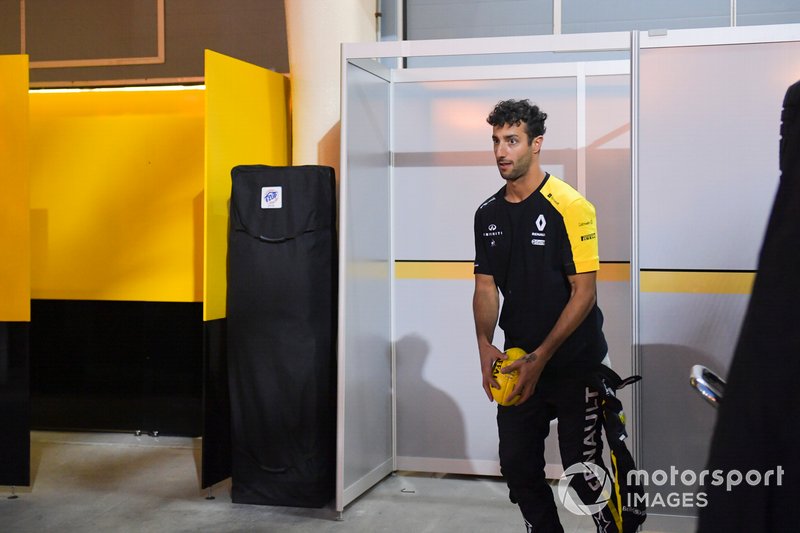 Daniel Ricciardo, Renault F1 Team plays with Aussie Rules football at the back of the garage
