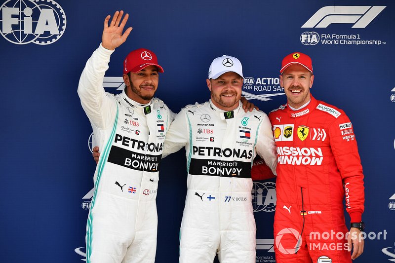 Top three Qualifiers Lewis Hamilton, Mercedes AMG F1, pole man Valtteri Bottas, Mercedes AMG F1, and Sebastian Vettel, Ferrari