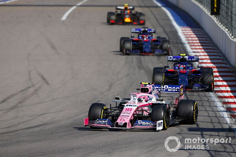 Lance Stroll, Racing Point RP19, leads Pierre Gasly, Toro Rosso STR14, Daniil Kvyat, Toro Rosso STR14, and Alex Albon, Red Bull RB15