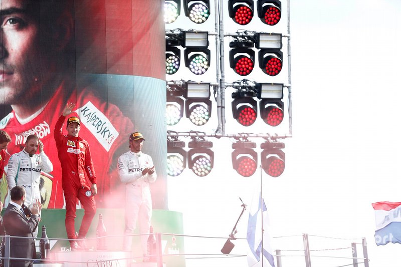 Valtteri Bottas, Mercedes AMG F1, 2nd position, Charles Leclerc, Ferrari, 1st position, and Lewis Hamilton, Mercedes AMG F1, 3rd position, on the podium