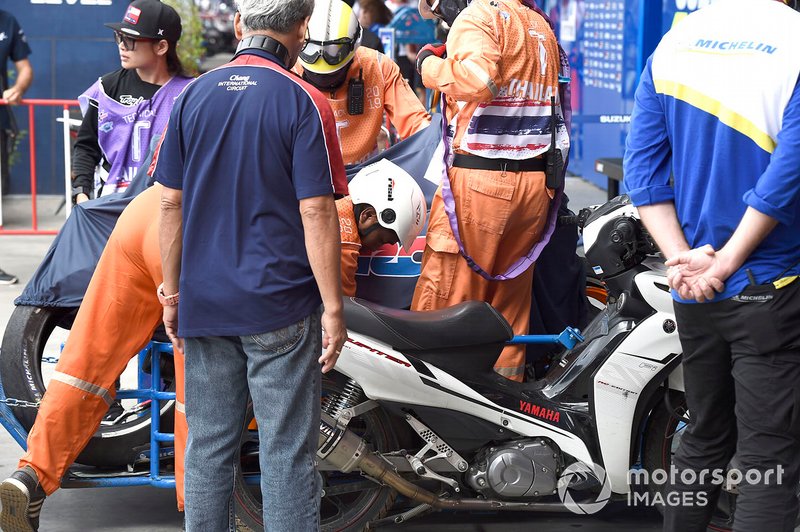 Marc Marquez, Repsol Honda Team, crashed bike covered up