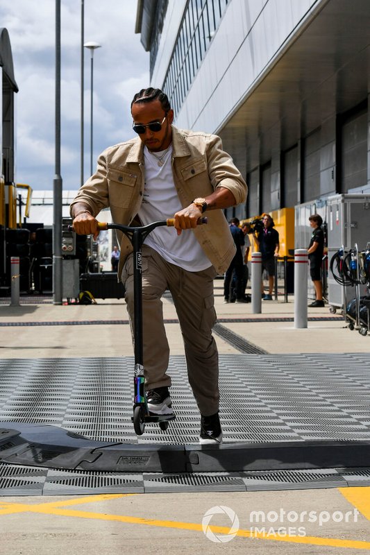 Lewis Hamilton, Mercedes AMG F1 on a scooter in the paddock