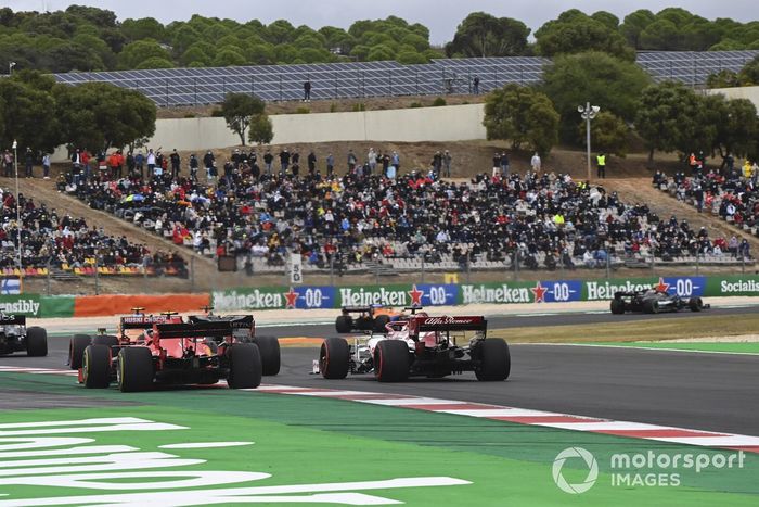 Charles Leclerc, Ferrari SF1000, Kimi Raikkonen, Alfa Romeo Racing C39, at the start