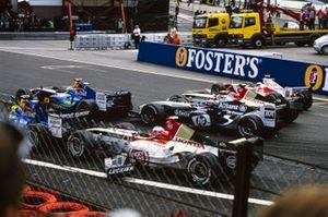 Jenson Button, BAR 006 Honda, breaks his front wing after contact with Felipe Massa, Sauber C23 Petronas. Giancarlo Fisichella, Sauber C23 Petronas, Juan Pablo Montoya, Williams FW26 BMW, Takuma Sato, BAR 006 Honda, and Olivier Panis, Toyota TF104B, are also in frame