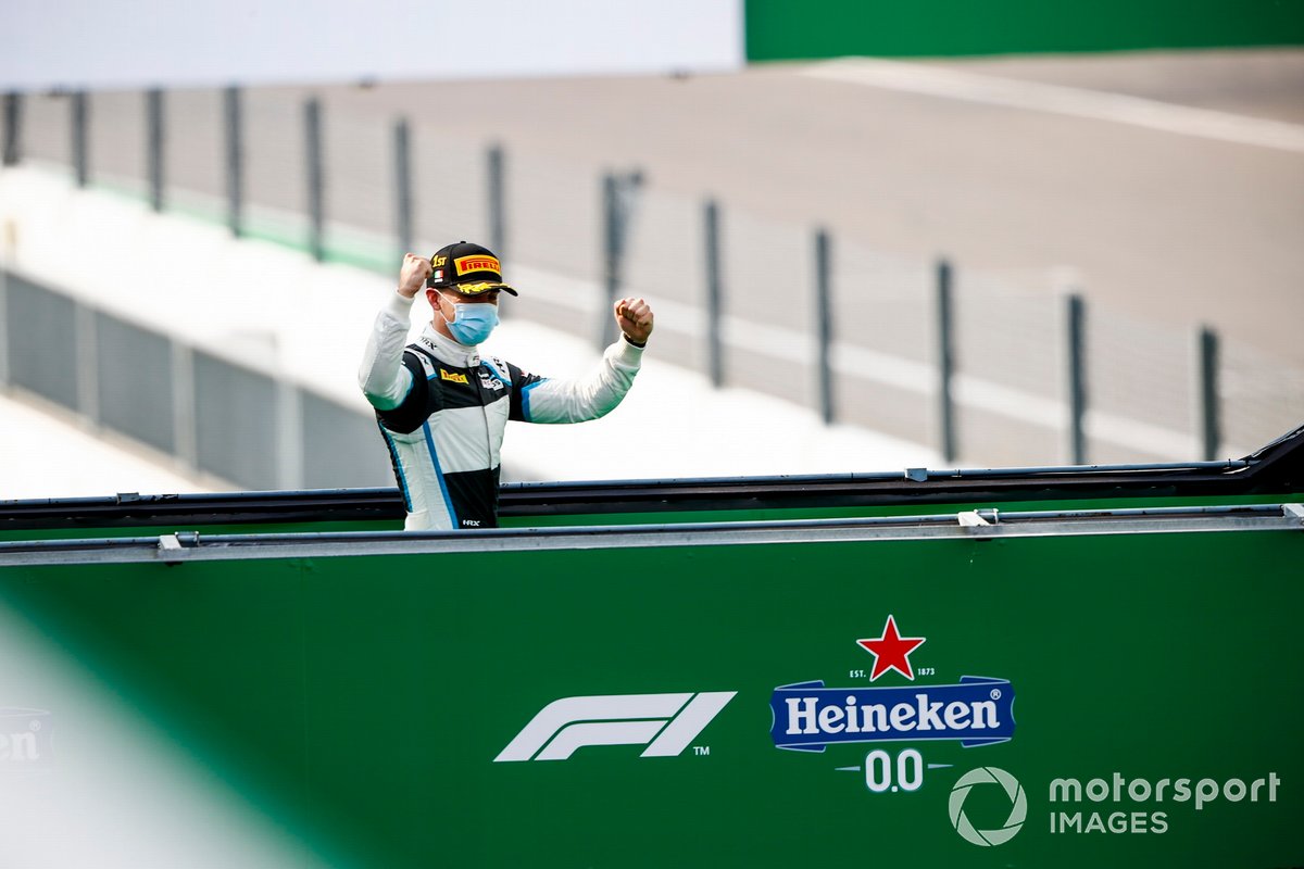 Race Winner Jake Hughes, HWA Racelab celebrates on the podium