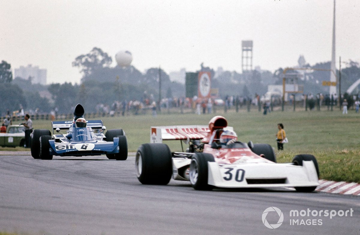 Jackie Stewart, Tyrrell 005 Ford chases Jean-Pierre Beltoise, BRM P160D