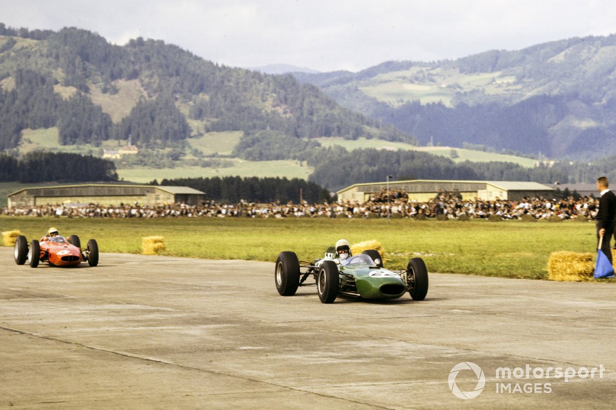 Bob Anderson, Brabham BT11 Climax leads Tony Maggs, BRM P57