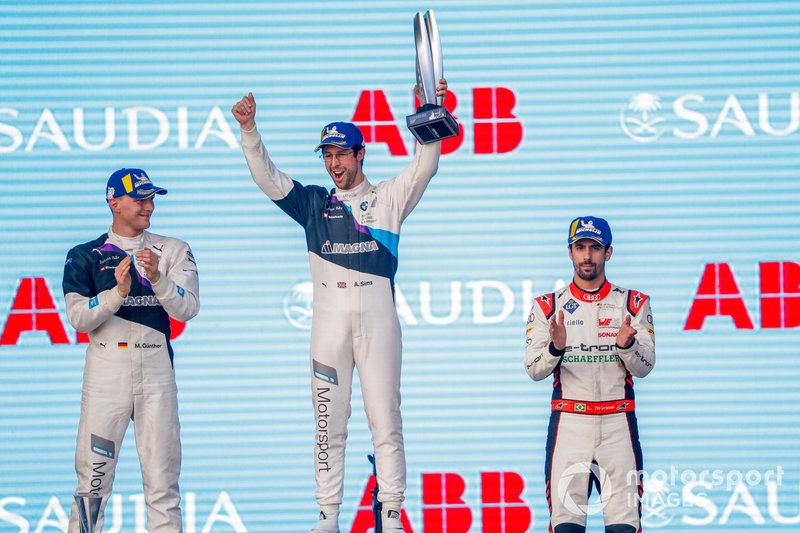 Race winner Alexander Sims, BMW I Andretti Motorsports celebrates on the podium with Maximilian Gunther, BMW I Andretti Motorsports, 2nd position, Lucas Di Grassi, Audi Sport ABT Schaeffler, 3rd position
