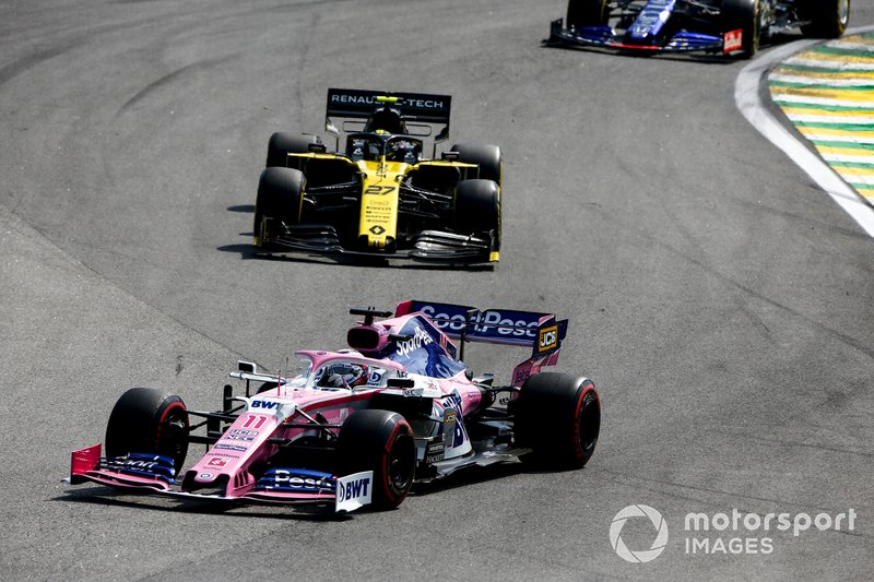 Sergio Perez, Racing Point RP19, leads Nico Hulkenberg, Renault F1 Team R.S. 19, and Daniil Kvyat, Toro Rosso STR14