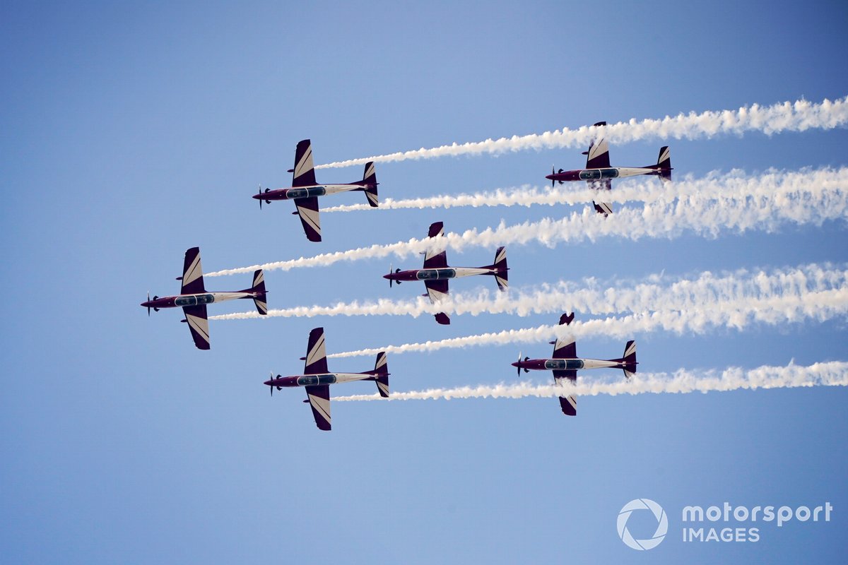 Aerial display team Wings of Qatar perform for the crowds in their Pilatus PC-21's