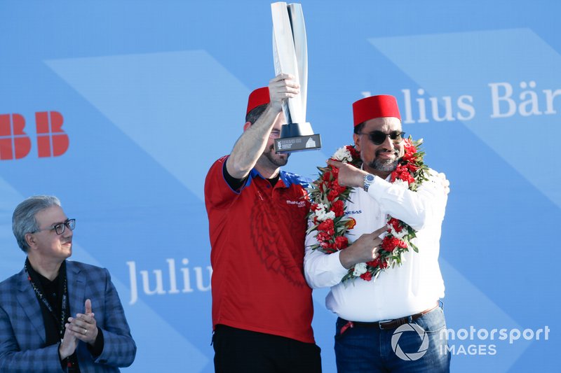 Dilbagh Gill, CEO, Team Principal, Mahindra Racing, celebrates with the constructors trophy on the podium