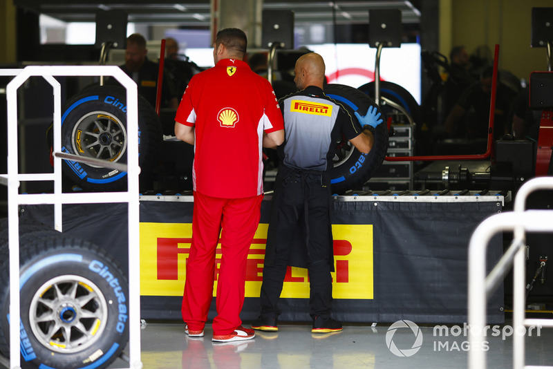 A Ferrari team member in the Pirelli sorting area