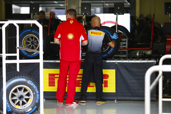 A Ferrari team member in the Pirelli sorting area