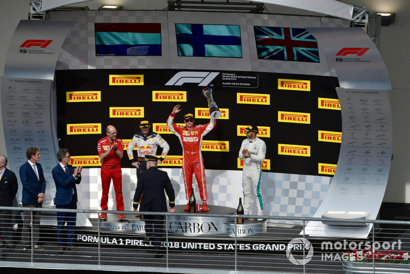 (L to R): Carlo Santi, Ferrari Race Engineer, Max Verstappen, Red Bull Racing, Kimi Raikkonen, Ferrari and Lewis Hamilton, Mercedes AMG F1 celebrate with the trophy on the podium 