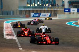 Sebastian Vettel, Ferrari SF71H, leads Kimi Raikkonen, Ferrari SF71H, and Charles Leclerc, Sauber C37, and Daniel Ricciardo, Red Bull Racing RB14