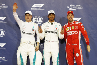Lewis Hamilton, Mercedes AMG F1, celebrates after taking pole position with Valtteri Bottas, Mercedes AMG F1, and Sebastian Vettel, Ferrari