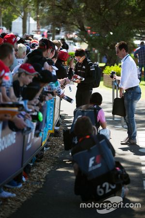 Rio Haryanto, Manor Racing signs autographs for the fans