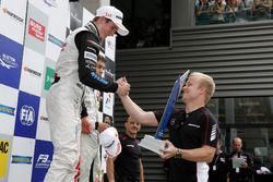 Podium, Joel Eriksson, Motopark, Dallara F312 - Volkswagen getting the trophy of Felix Rosenqvist, 2