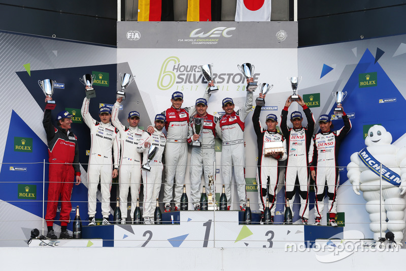 Podium: race winners Marcel Fässler, Andre Lotterer, Benoit Tréluyer, Audi Sport Team, second place,