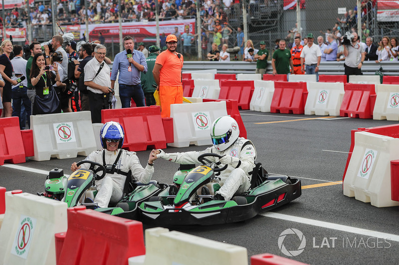 David Coulthard races football player Christian Karembeu in karts