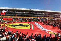 Fans and giant Ferrari flag