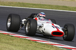 Takuma Sato drives a Honda RA300