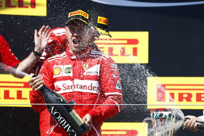 Podium: race winner Sebastian Vettel, Ferrari