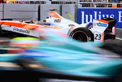 Oliver Turvey, NEXTEV TCR Formula E Team, passes the crashed car of Nick Heidfeld, Mahindra Racing