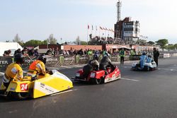 John Holden and Lee Cain take the Isle of Man TT sidecar newcomers on their speed-controlled lap