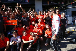Romain Grosjean, Haas F1 Team, Kevin Magnussen, Haas F1 Team, and the Haas F1 team celebrate the team's best finish to date