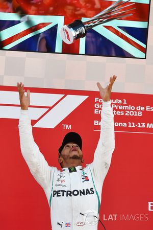 Race winner Lewis Hamilton, Mercedes-AMG F1 celebrates on the podium with the trophy