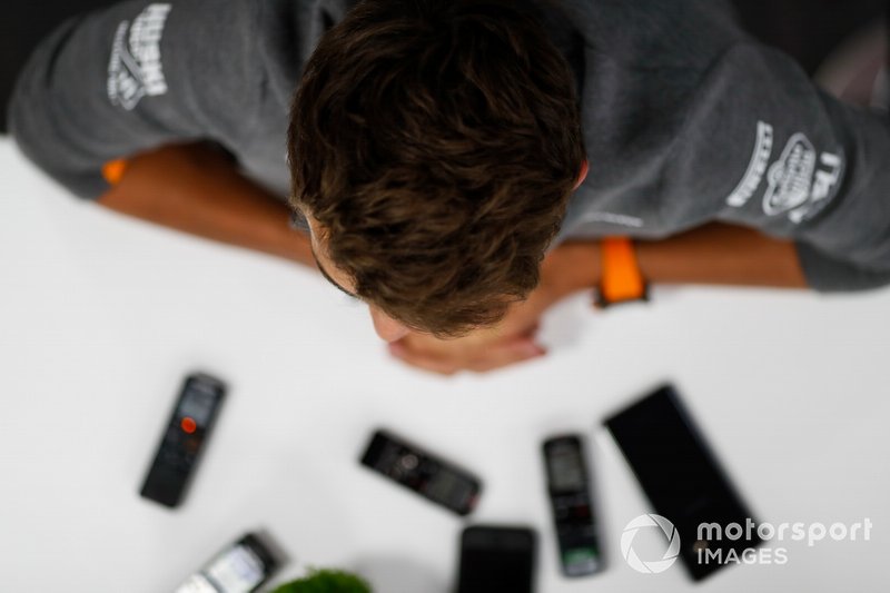 Lando Norris, McLaren, talks to the media