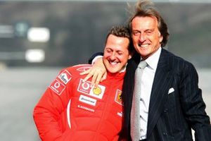 Luca di Montezemolo, Presidente Ferrari, (a destra) abbraccia Michael Schumacher