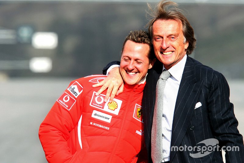 Luca di Montezemolo, Presidente Ferrari, (a destra) abbraccia Michael Schumacher