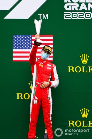 Race Winner Logan Sargeant, Prema Racing celebrates on the podium with the trophy