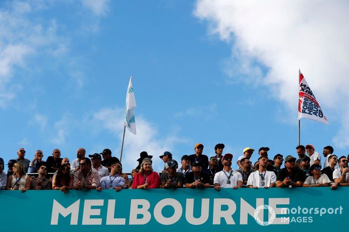 Fans watch from a balcony