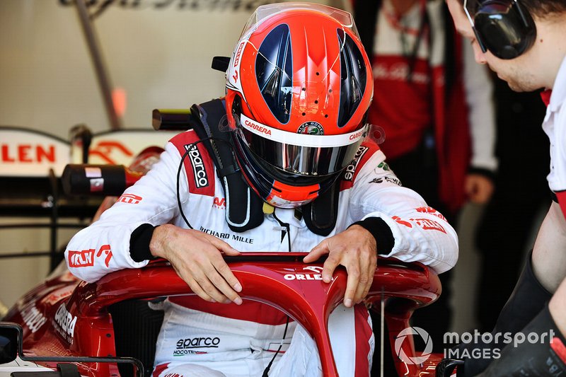 Robert Kubica, Alfa Romeo, enters his cockpit