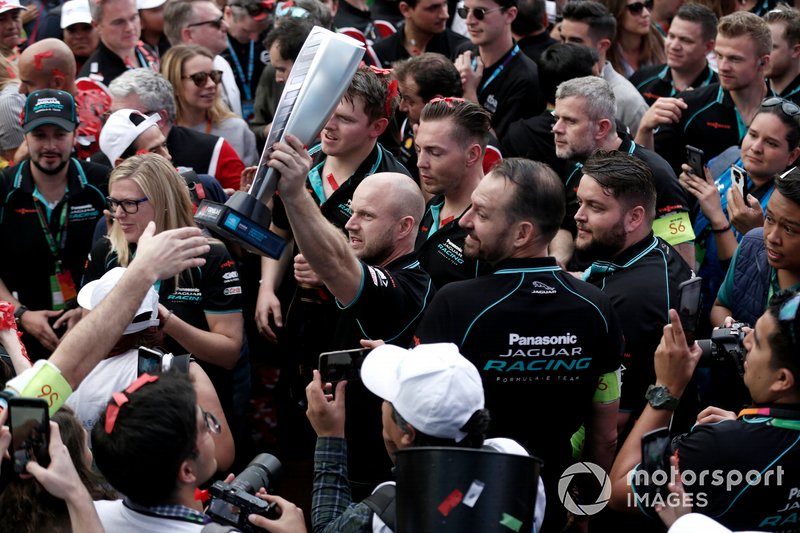 The Jaguar team celebrate at the podium