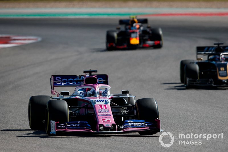 Sergio Perez, Racing Point RP19, leads Romain Grosjean, Haas F1 Team VF-19, and Alex Albon, Red Bull Racing RB15