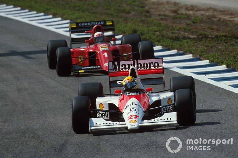 На 59-м круге свершилось неизбежное. McLaren и Ferrari оказались рядом…