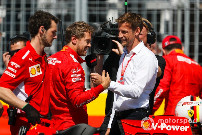 Pole man Sebastian Vettel, Ferrari, is interviewed by Jenson Button, Sky Sports F1, after Qualifying