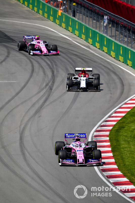 Sergio Perez, Racing Point RP19, leads Antonio Giovinazzi, Alfa Romeo Racing C38, and Lance Stroll, Racing Point RP19